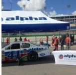 Rain Doesn’t Delay Fun for Alpha Energy Solutions Customers at Kentucky Speedway 2 Alpha Energy Solutions’ colors were prominent in the Fan Zone, where Barry Hartlage welcomed